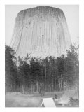 Devil's Tower with 4 People in the Foreground Photograph - Devil's Tower, WY Posters