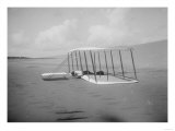 Wilbur Wright in prone position on glider Photograph - Kitty Hawk, NC Posters