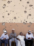 Lebanese Residents Rest in Front of a Wall Photographic Print