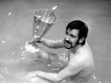 Rangers' John Greig Celebrates with European Cup Winners Cup Trophy in the Bath. May 1972 Photographie
