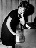 Shirley Bassey Tries Piano During Press Conference in the Cocktail Lounge of the "Talk of the Town" Photographic Print