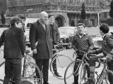 Actor Telly Savalas, Surrounded by Young Fans During a Walk in London with His Wife Photographic Print
