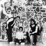 Genesis Pop Group L to R Phil Collins Tony Banks and Mike Rutherford Fotografisk tryk Genesis Pop Group L to R Phil Collins Tony Banks and Mike Rutherford Fotografisk tryk