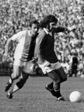 George Best of Manchester United 1971 in Action Against Crystal Palace. September 1971 Lámina fotográfica George Best of Manchester United 1971 in Action Against Crystal Palace. September 1971 Lámina fotográfica