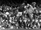 Arsenal Versus Nottingham Forrest, 1977. Kenny Burns Tackles Frank Stapleton Photographic Print