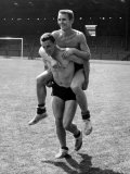 Taken For a Ride That's What Brian Clough is Doing to One of His Team-Mates. August 1959 Fotografie-Druck