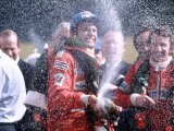 Carlos Reutemann of Ferrari Winner with Champagne After Motor Racing Lámina fotográfica