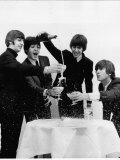Beatles Sitting Round a Table with Glasses of Champagne Fotoprint