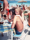Footballer George Best with Actress and Model Susan George on Holiday in Palmanova, Majorca in 1969 Photographie