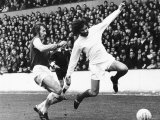 Billy Bonds of West Ham Challenges George Best of Manchester United at Upton Park Photographic Print