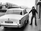 Manchester United Footballer George Best Arriving at Old Trafford For a Training Session Lámina fotográfica