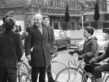 Actor Telly Savalas, Surrounded by Young Fans During a Walk in London with His Wife Photographic Print