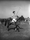 Prince Philips Rides Along on Horseback Holding Polo Stick During Game Photographic Print
