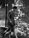 Prince Charles Walks a Dog at the Sandringham Shooting January 1981 Photographic Print