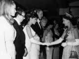 Raquel Welch Meets Queen Elizabeth in 1966 with Woody Allen and Ursula Andress Photographic Print