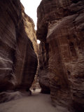 Hikers in the Siq Canyon Leading to Petra Photographic Print by Gordon Wiltsie