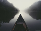 Canoe on Misty River Photographic Print by Mattias Klum