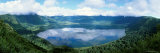 Clouds are Reflected in the Waters of Embakai Crater Photographie par David Pluth
