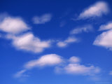 Blue Sky in Summer with Cumulus Clouds Photographic Print by John Eastcott & Yva Momatiuk