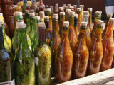 Close View of a Colorful Group of Bottles Containing Foodstuffs Photographie par Ed George