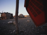 Shelters Made Out of Cow Dung and Sticks by the Himba Tribespeople Photographie par Joy Tessman