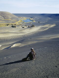 Woman Sits Near the Lake Inside the Waw An Namus Volcano, Photographic Print