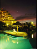 Night View with Venus of Modern Hotel with Swimming Pool Photographic Print by Steve Winter