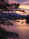 Sunset over Passenger Sampans on Sarawak River Photographic Print by John Borthwick
