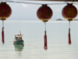 Boat with Blurred Lamp Shades in Foreground, Bophut Village Photographic Print by John Borthwick