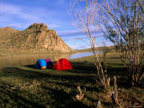 Tourists' Tents Pitched by a Waterway Lámina fotográfica por Jerry Galea Tourists' Tents Pitched by a Waterway Lámina fotográfica por Jerry Galea