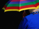 Woman Holding Umbrella Photographic Print by Rick Rudnicki