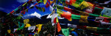 Buddhist Prayer Flags Framing Mt Miacimu, Meili Xueshan Mountain Range Fotografie-Druck von Richard I'Anson