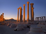 Part of Illuminated Colonnade Ruin with Qala't Ibn Maan on the Hilltop Behind Photographic Print by Patrick Horton