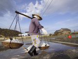 Woman Harvesting Salt in Salt Fields or Pans Photographie par Dan Gair