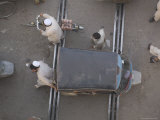 Overhead View of Men Pushing Rickshaw across Train Lines Photographic Print by Gavin Quirke