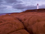Lighthouse and Red Sandstone Cliffs Photographic Print by Guylain Doyle