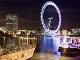 Blurred London Eye Reflected in the Thames at Night with Floating Restaurants in the Foreground Photographic Print by Orien Harvey