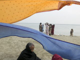 Woman Dries Her Sari Down by the Ganges Photographic Print by Gavin Quirke