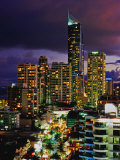 Hi-Rise Apartments Including Q1 Tower at Dusk Photographie par Richard I'Anson