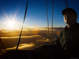 Facial Detail of Hot-Air Balloon Pilot as Sun Rises During Take Off Fotografisk trykk av Tim Barker Facial Detail of Hot-Air Balloon Pilot as Sun Rises During Take Off Fotografisk trykk av Tim Barker