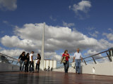 People Walking across the Puente De La Mujer Photographic Print by Terry Carter