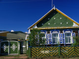 Traditional Painted Cottage in the Picturesque Village of Baikalskoe Photographic Print by Simon Richmond