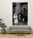 Lorenza Curiel in White First Communion Dress Waiting for Mother to Lock Door Wall Mural by W. Eugene Smith