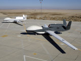 Two Global Hawks Parked on a Ramp Lámina fotográfica por Stocktrek Images