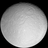 Saturn's Icy Moon Rhea Photographic Print by Stocktrek Images 