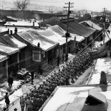 Communist Soldiers Marching Through Town Photographic Print by George Lacks