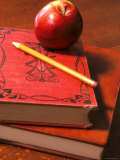 Red Apple on Books with Pencil Photographic Print