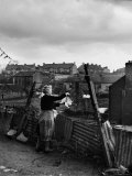 Woman Hanging Wash in a Dublin Slum Photographic Print by Tony Linck