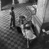 US Army Nurse 2nd Lt. Florence Vehmeier Walking Past GI with Bullet Wound in His Stomach, WWII Lámina fotográfica por W. Eugene Smith