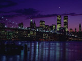 Skyline of New York City with Illuminated Lights Off Buildings and High-Rises at Night Fotografie-Druck